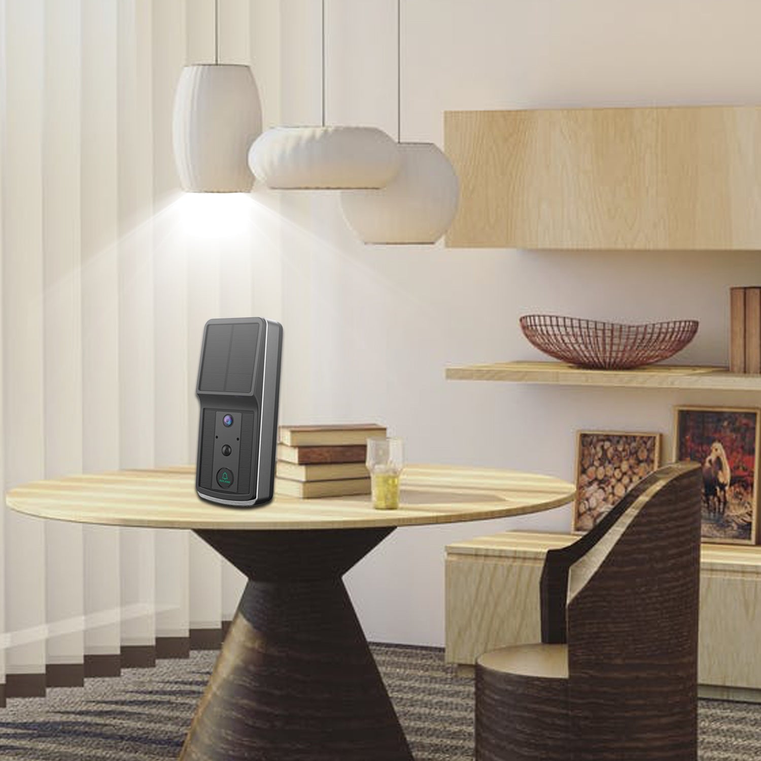 Modern dining area with round wooden table, pendant lights, and smart security doorbell on table