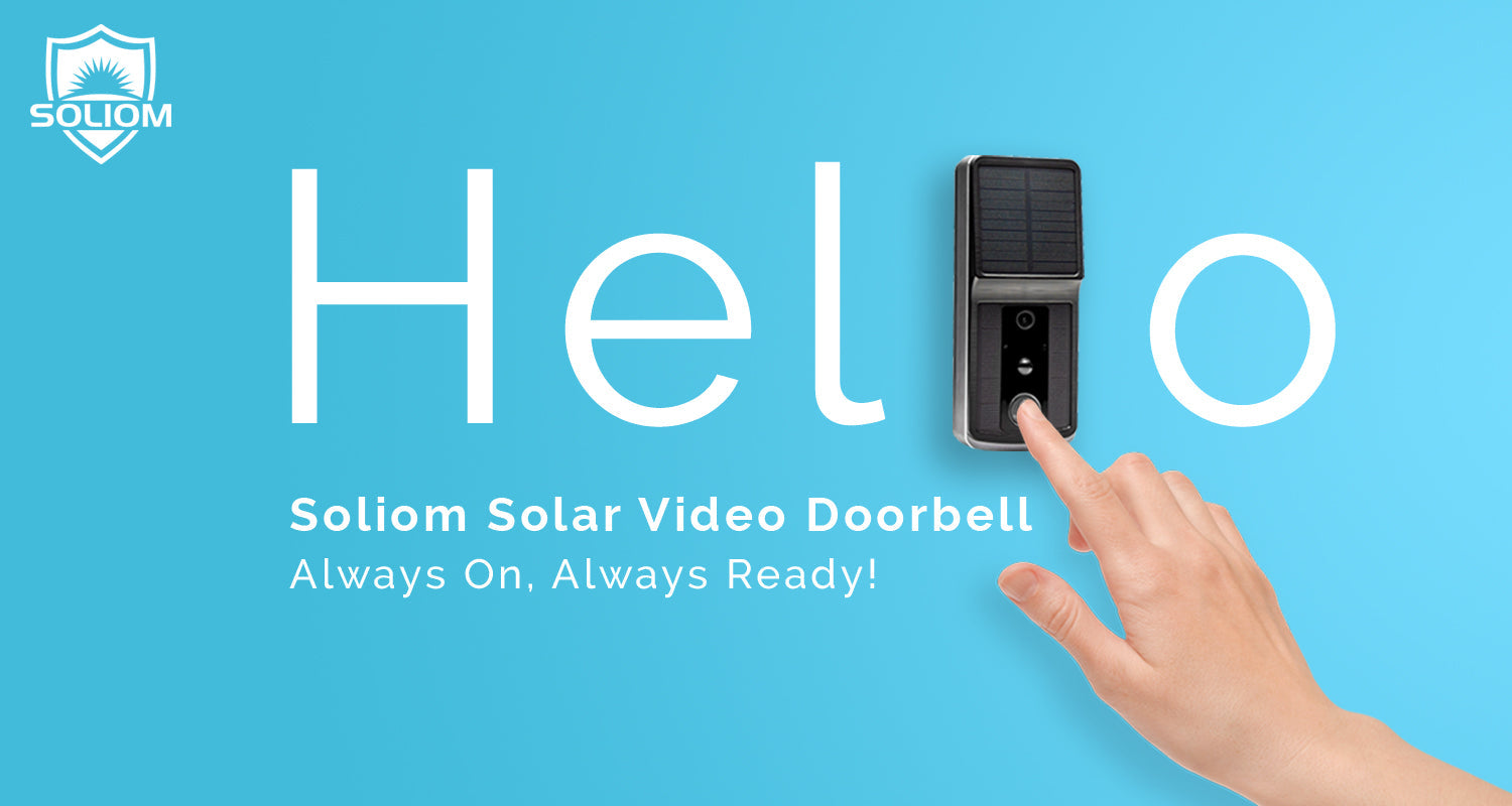 Hand pressing Soliom solar video doorbell on blue background with Hello text