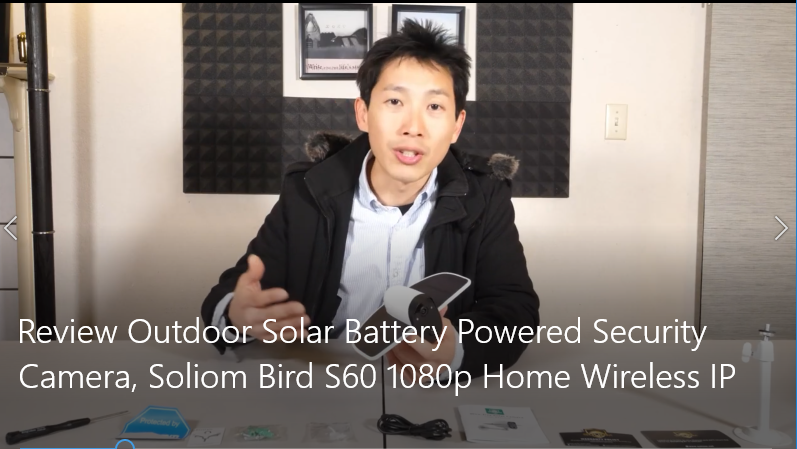 Man demonstrating Soliom Bird S60 1080p solar battery powered wireless IP security camera indoors