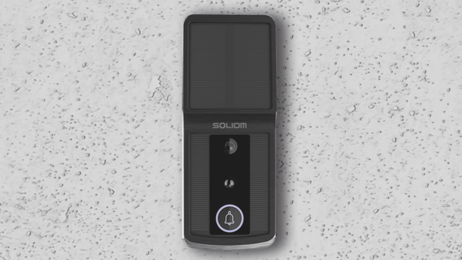 Soliom solar-powered smart video doorbell mounted on a light textured wall