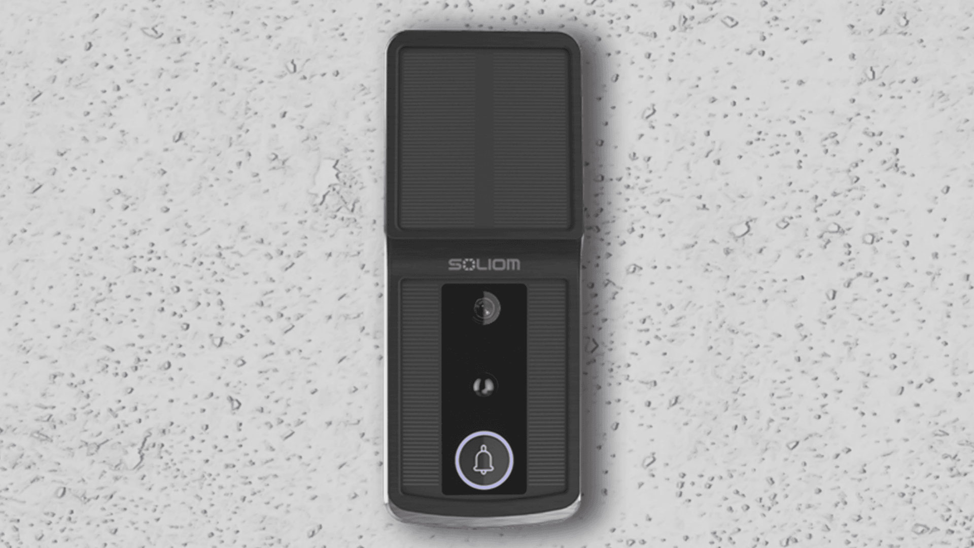 Soliom solar-powered smart video doorbell mounted on a light textured wall