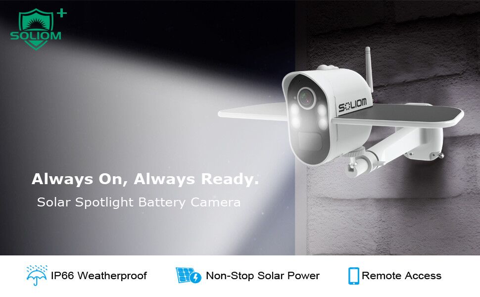 White Soliom solar spotlight battery security camera mounted on a wall with spotlight beam, IP66 weatherproof