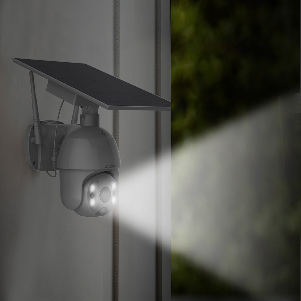 Soliom solar-powered outdoor security camera with spotlight mounted on gray wall